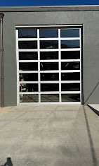 White full-view glass commercial overhead door